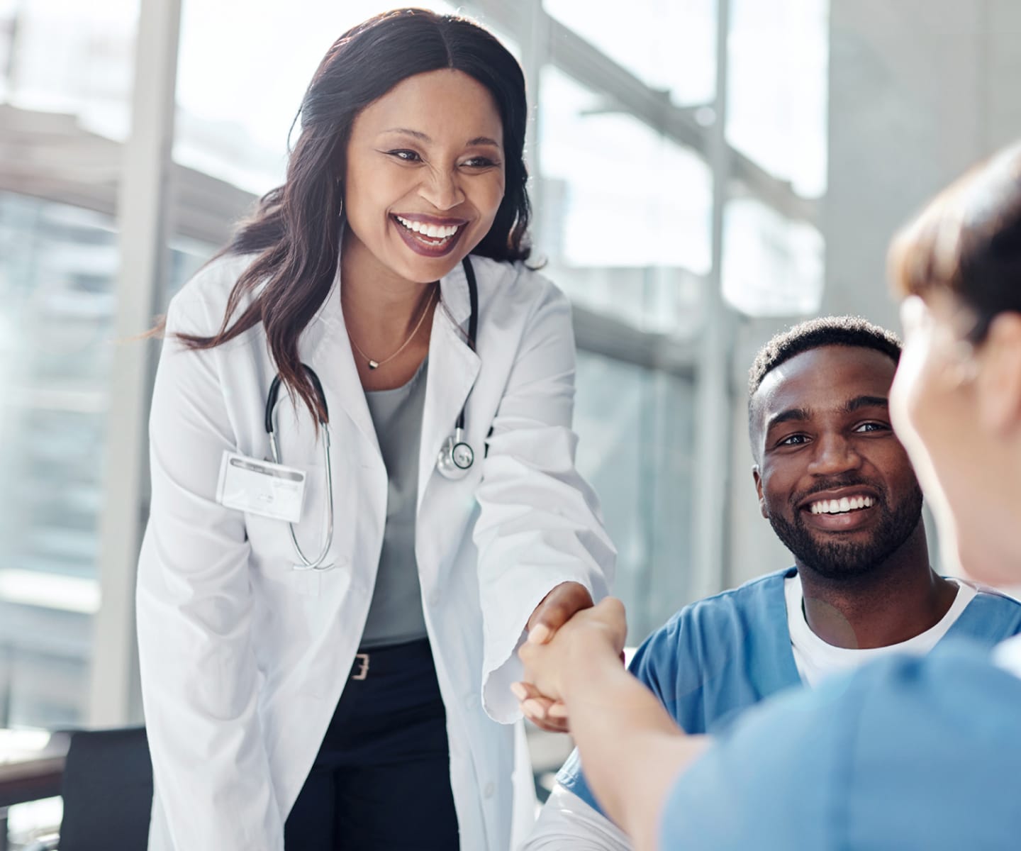 Doctor speaking with couple